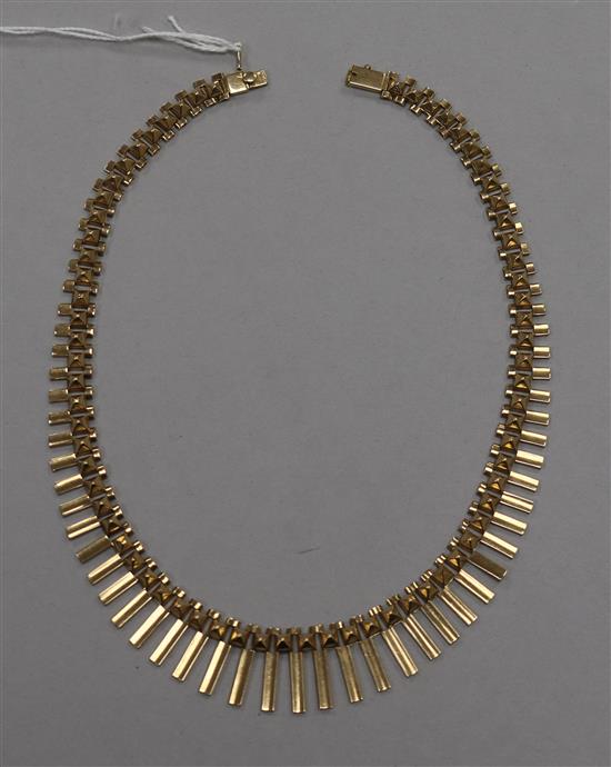 A stylish early 1960s 14ct gold fringe necklace, with pyramid shaped links, 41.5cm